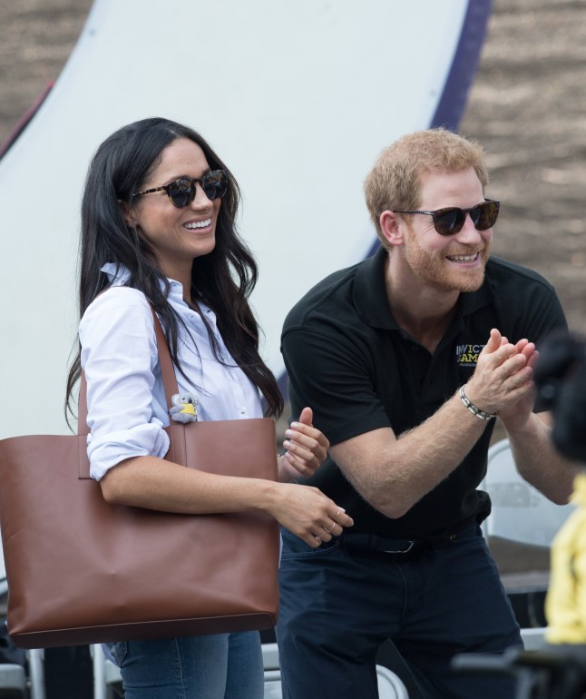 TORONTO, ON - SEPTEMBER 25: Meghan Markle and Prince Harry appear together at the wheelchair tennis on day 3 of the Invictus Games Toronto 2017 on September 25, 2017 in Toronto, Canada. The Games use the power of sport to inspire recovery, support rehabilitation and generate a wider understanding and respect for the Armed Forces. (Photo by Samir Hussein/WireImage)
